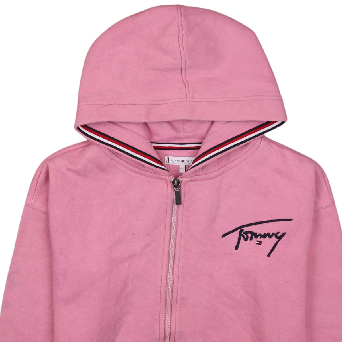 Brand and care label for Tommy Hilfiger girls’ pink full zip hoodie, size 152, logo cotton blend