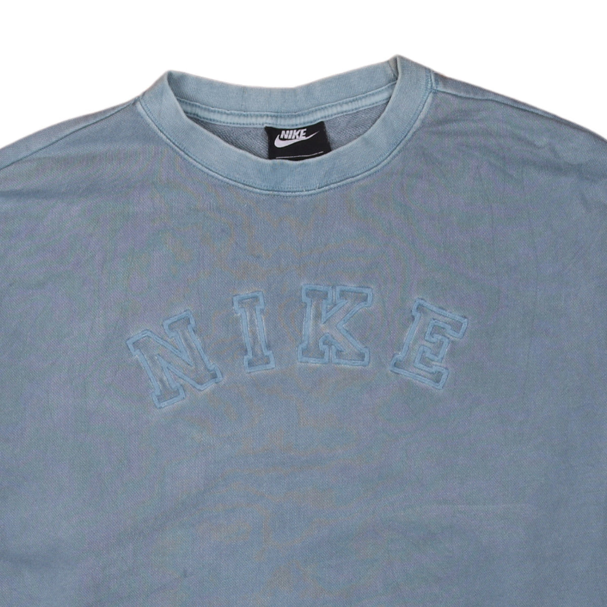 Brand and care label for Nike Women's Blue Pullover Sweatshirt Medium Crew Neck Embroidered Logo