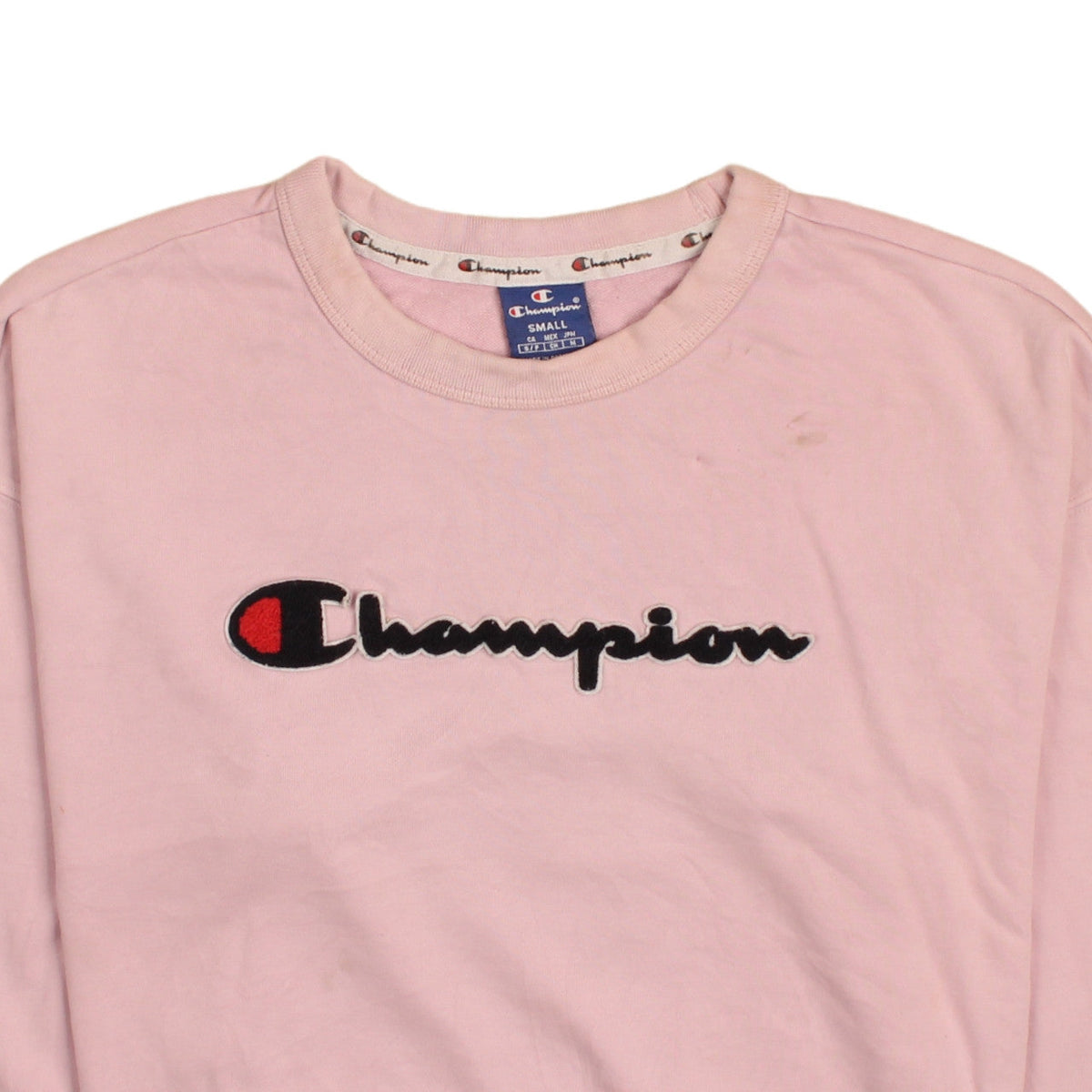 Brand and care label for Champion women’s pink small pullover sweatshirt with logo embroidery