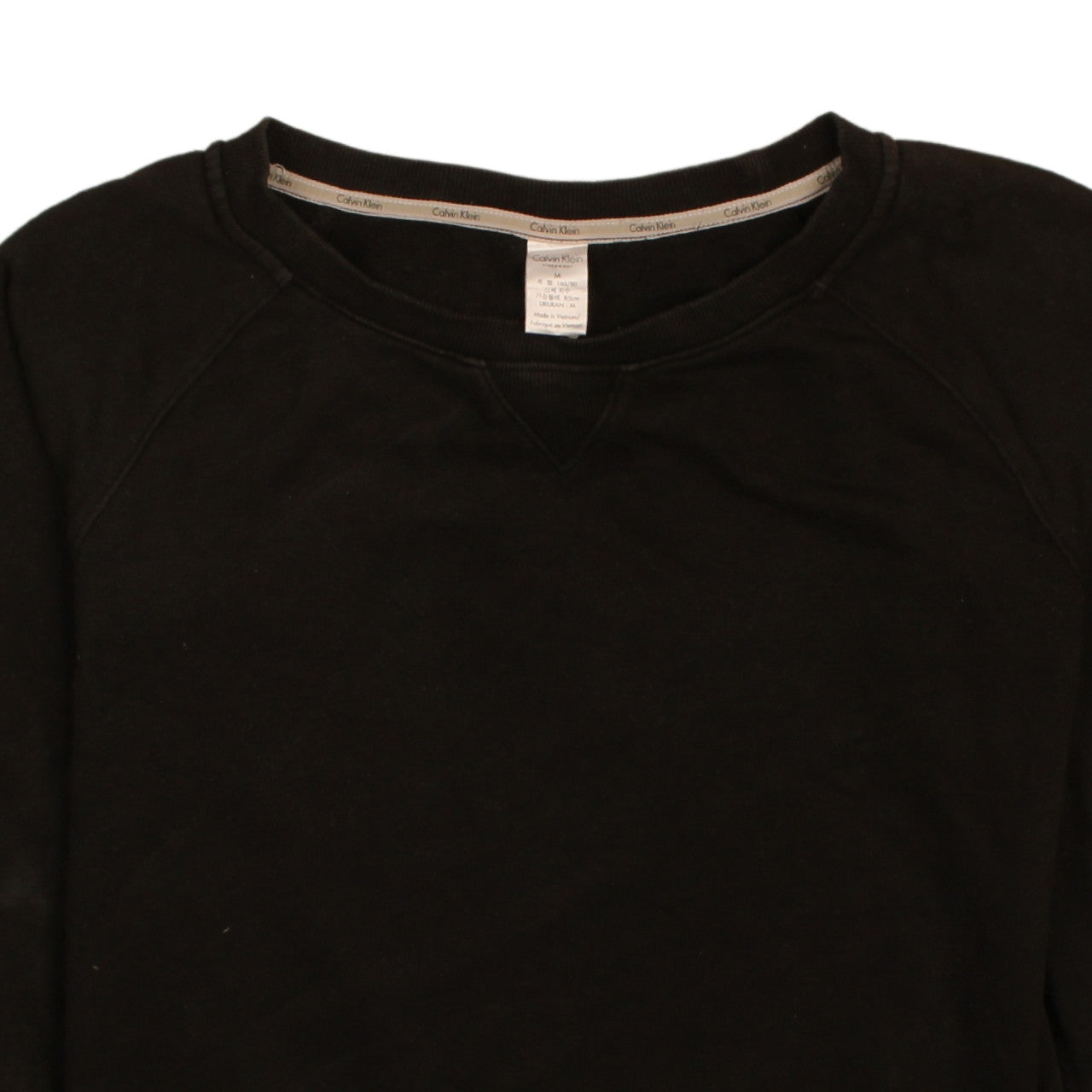 Brand and care label for Calvin Klein Women Black Crew Neck Pullover Sweatshirt M