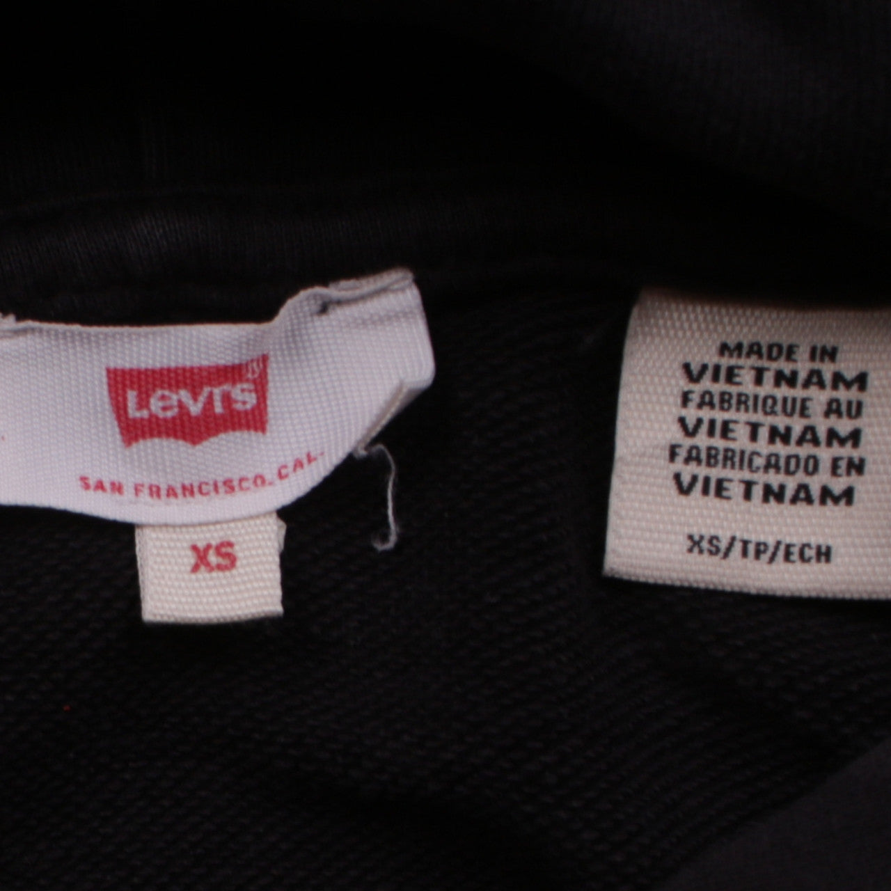 Brand and care label for Levi's Men's Black XS Pullover Hoodie with Logo Pocket