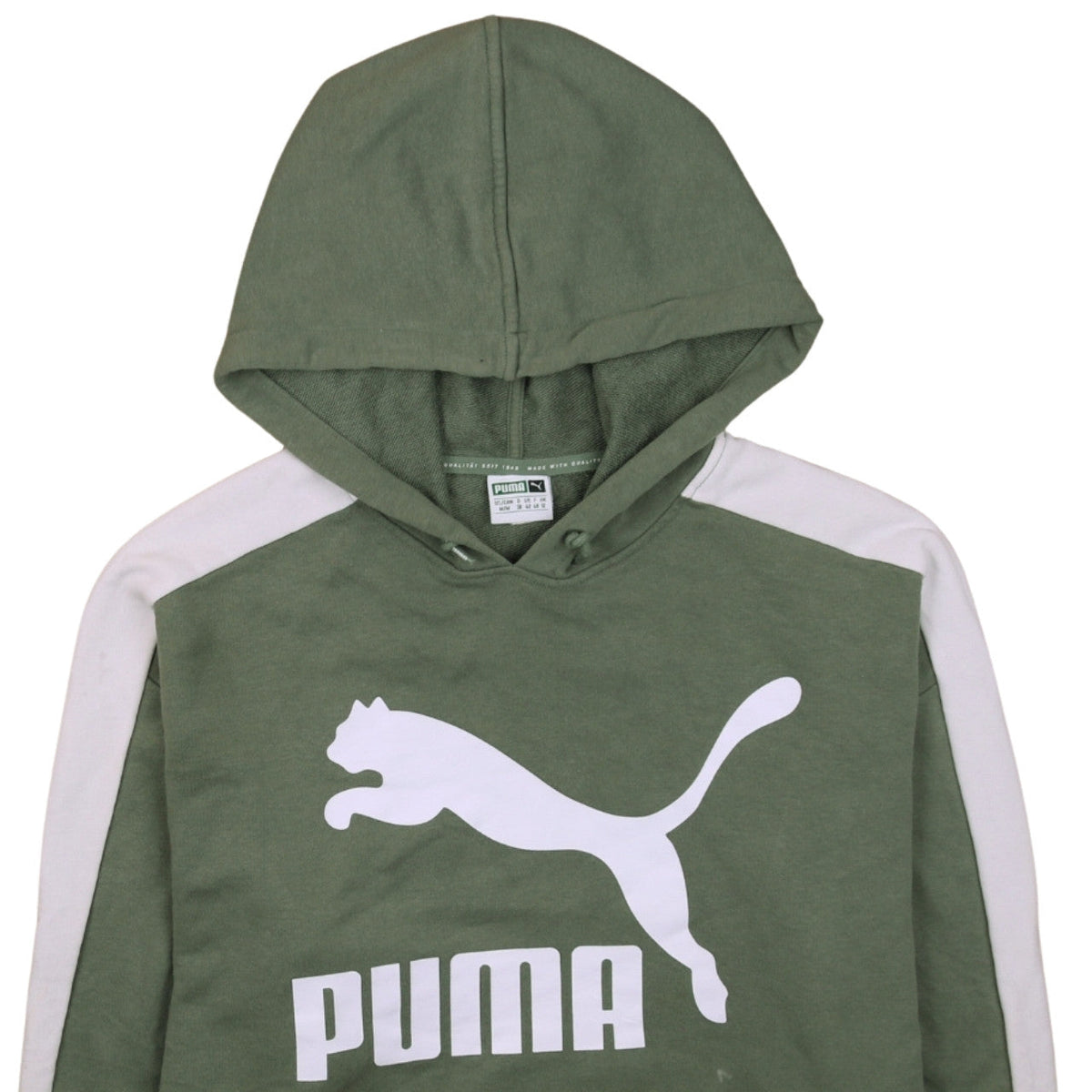 Brand and care label for Puma Women's Green White Pullover Hoodie, size 12, Logo Print