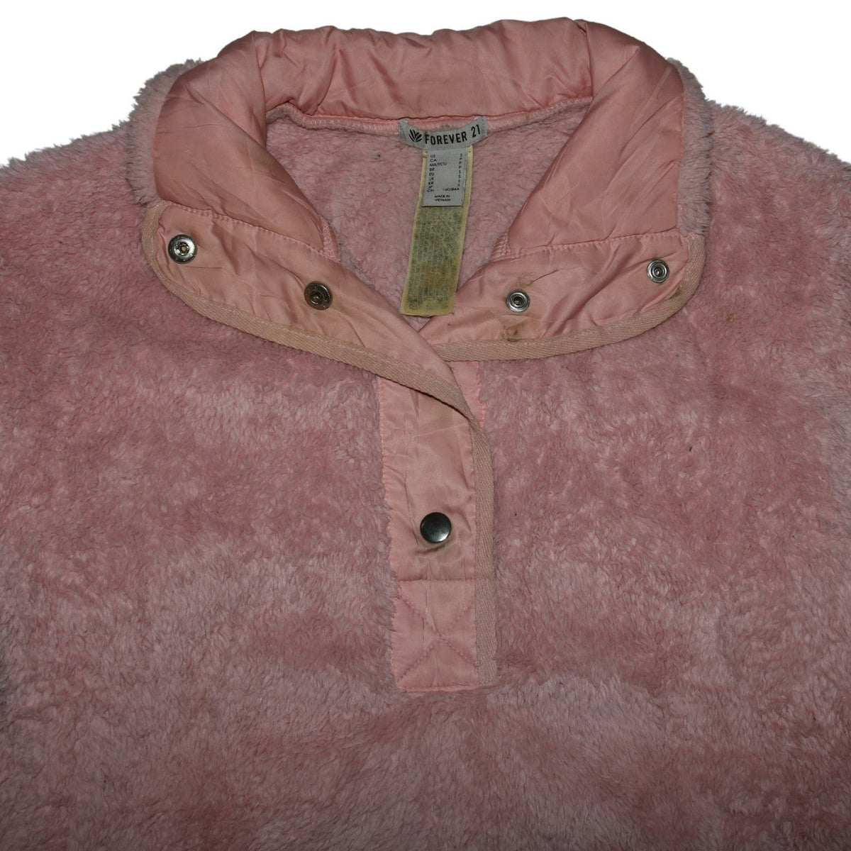 Brand and care label for Forever 21 Women Pink Fleece Pullover Sweatshirt, size S