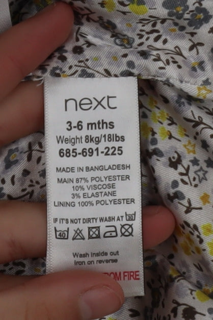 Brand and care label for Next girls’ grey mid-length bow trim wool look coat 2xs 3-6 months
