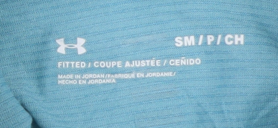 Brand and care label for Under Armour Men's Blue Small 1/4 Zip Running Track Jacket