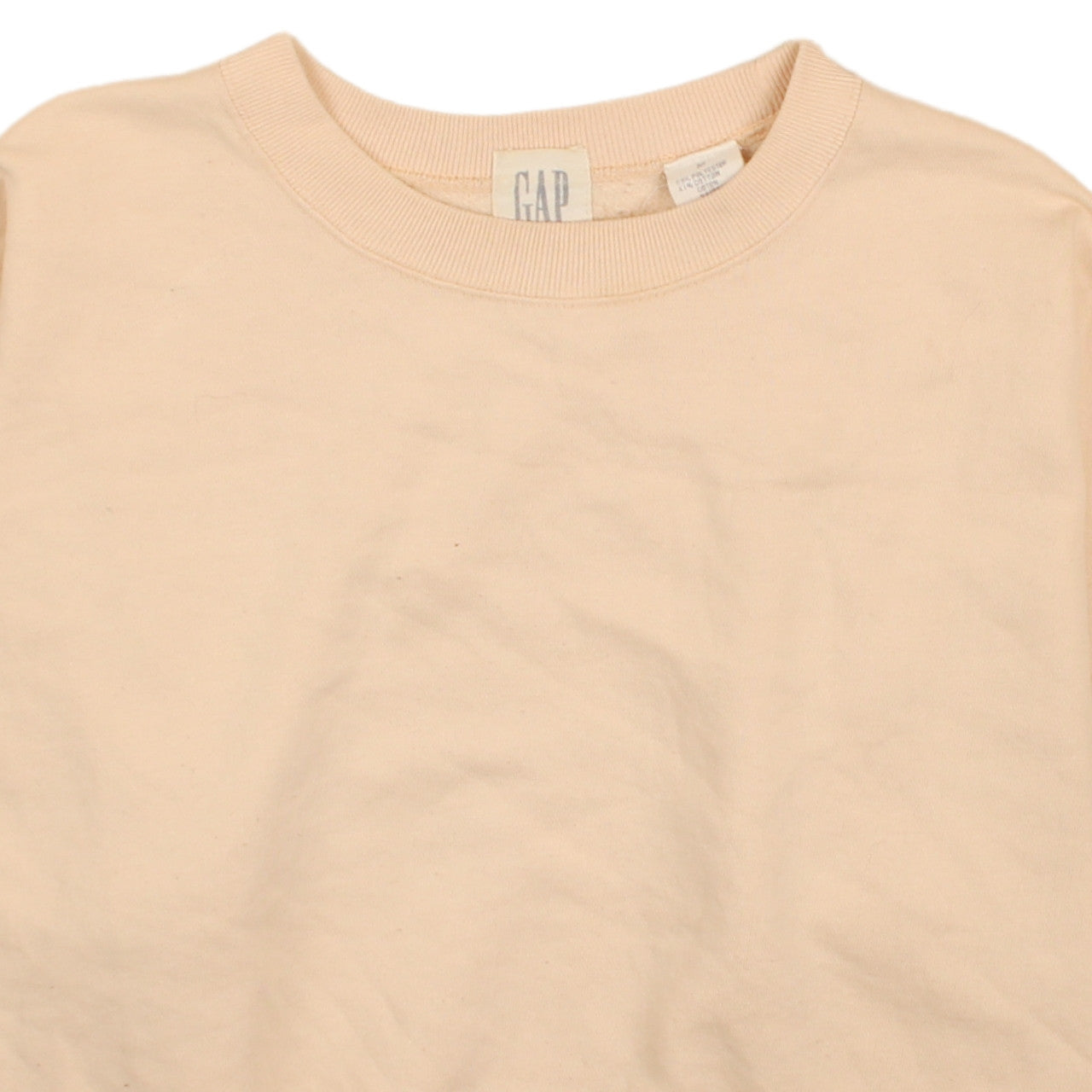 Brand and care label for Gap women’s beige pullover sweatshirt cotton blend, size M, casual