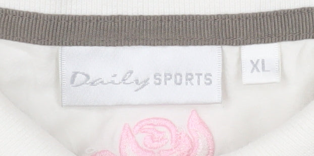 Brand and care label for Daily Sports Women's Beige Striped Floral Sleeveless Polo Shirt XL