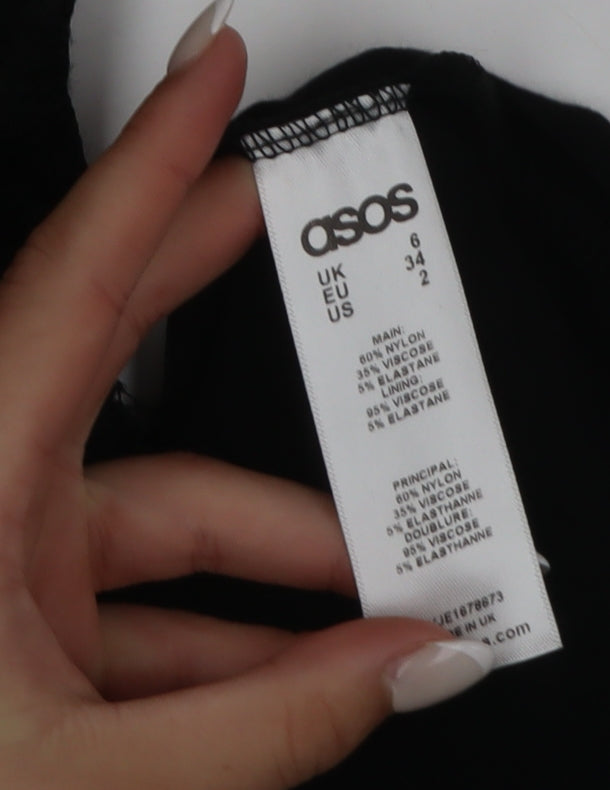 Brand and care label for ASOS Women’s Black Lace Bodycon Knee Length Dress, size UK 6