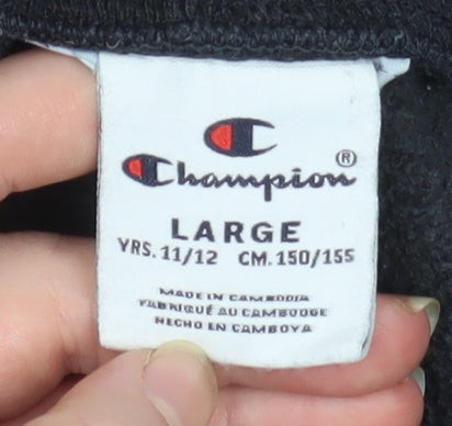 Brand and care label for Champion boys’ black jogger trousers 11-12 years fleece lined activewear
