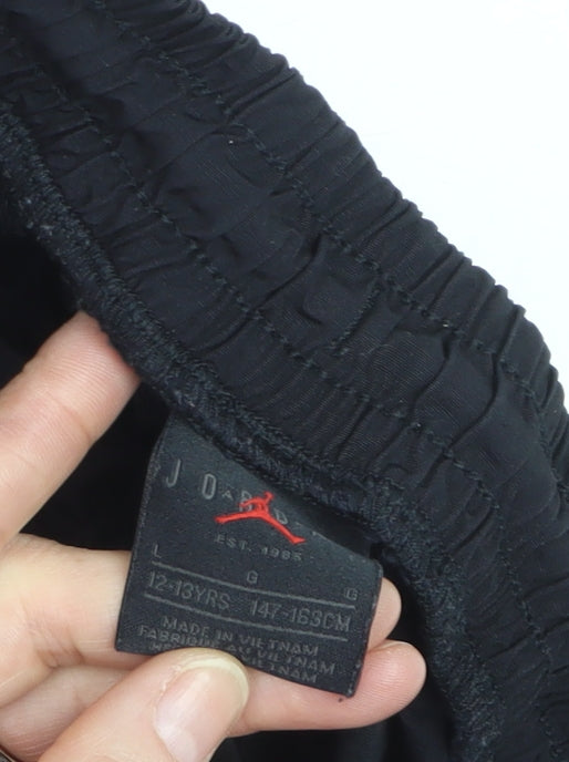 Brand and care label for Jordan boys’ black 12-13 years jogger activewear trousers with pockets