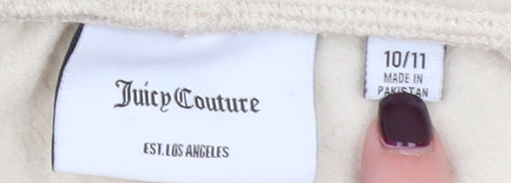 Brand and care label for Juicy Couture girls’ beige & black jogger sweatpants, size 10/11, drawstring waist