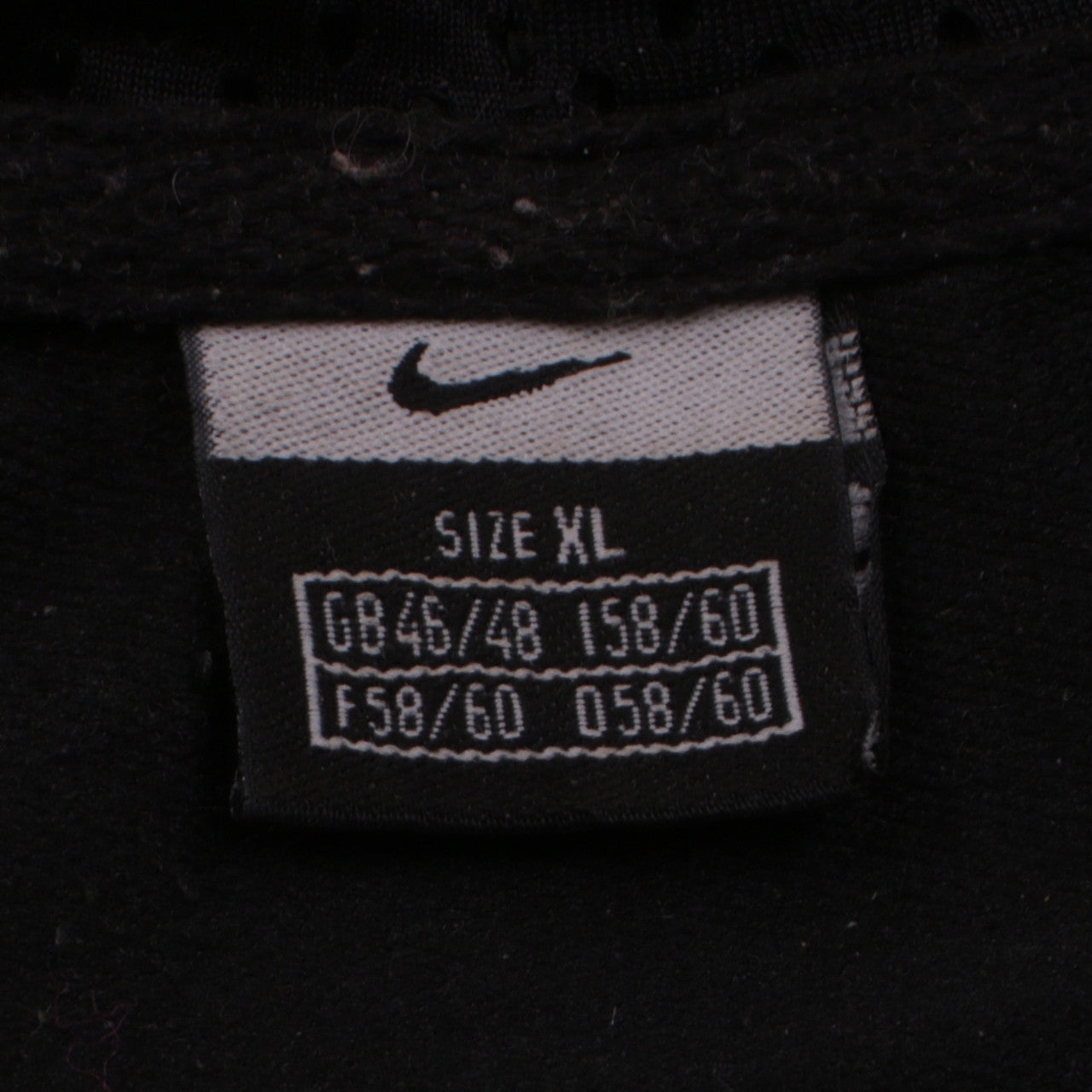 Close-up detail of Nike boys’ black full zip hoodie xl lightweight sportswear