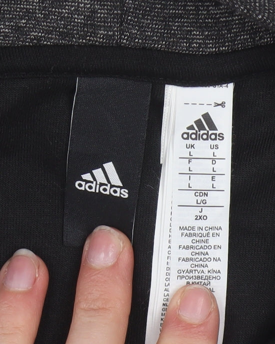 Brand and care label for Adidas Men's Grey Full Zip Hoodie, size L, Sports Basketball EG Logo