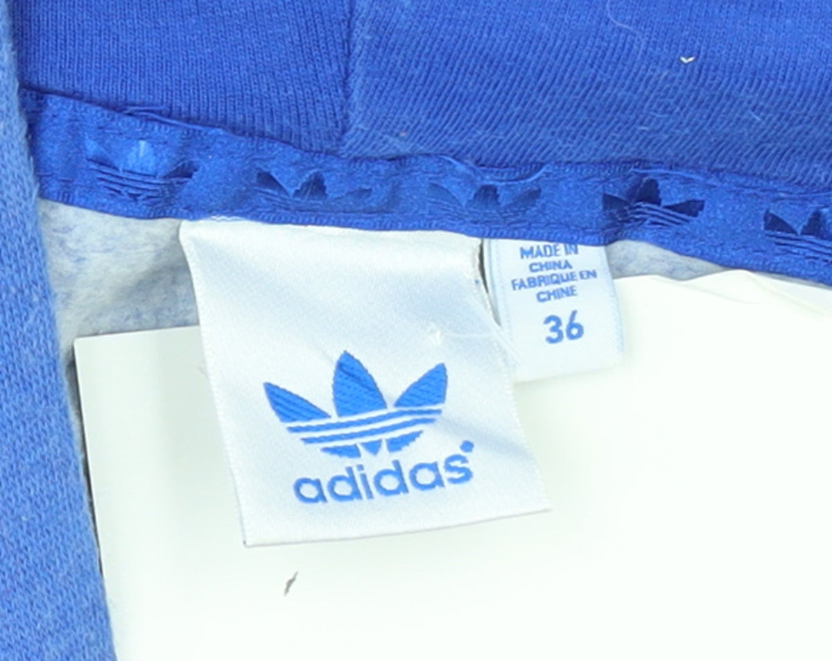 Brand and care label for Adidas Women's Blue Pullover Hoodie, size 10, Drawstring Logo