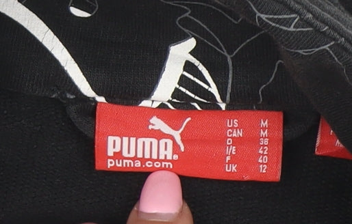 Brand and care label for Puma Women's Black, size 12, Full Zip Sweatshirt with Gold Logo