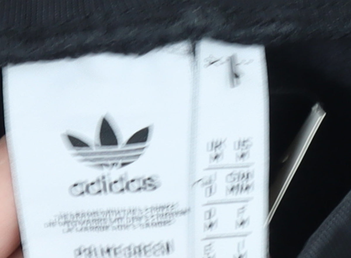 Brand and care label for Adidas Men Black Jogger Sweatpants M Fleece Casual Tapered