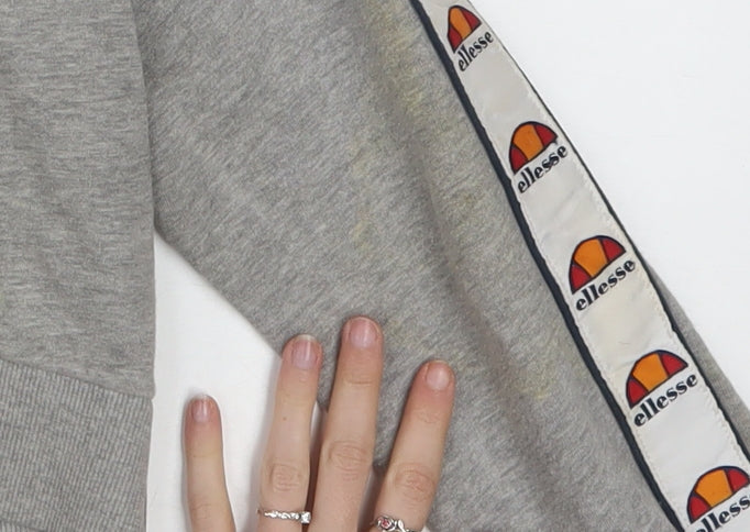 Additional view of Ellesse women’s grey half zip cropped hoodie, size UK 8, logo tape detail