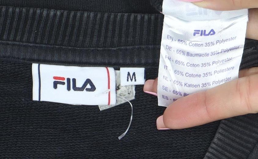 Brand and care label for Fila men’s black logo tape crew neck sweatshirt, size M