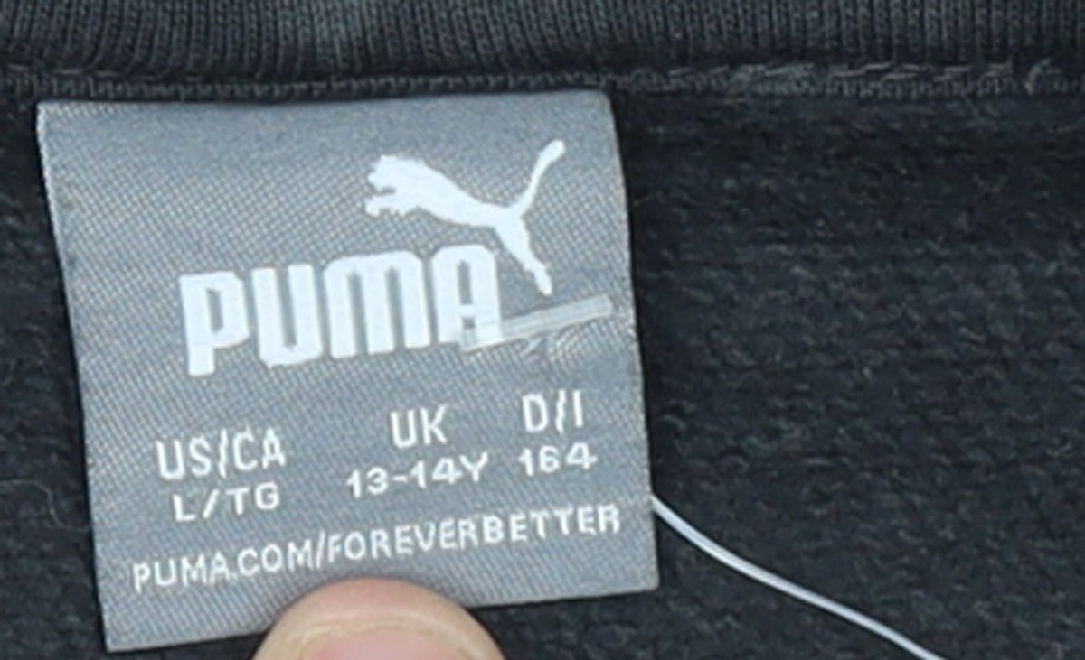 Brand and care label for Puma boys’ black pullover hoodie 13-14 years fleece graphic logo sweatshirt