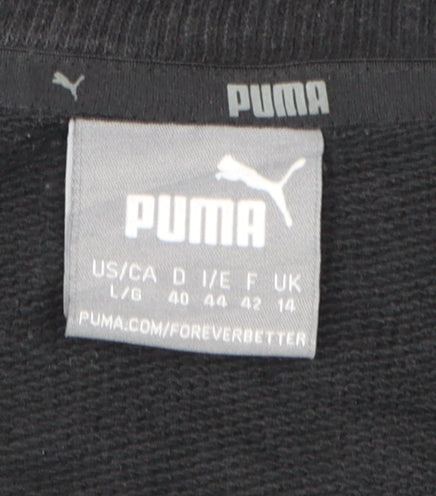 Brand and care label for Puma women’s black crew neck pullover sweatshirt, size UK 14
