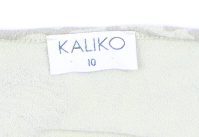 Brand and care label for Kaliko Women’s Beige Floral V-Neck 3/4 Sleeve Stretch Tunic Blouse, size UK 10