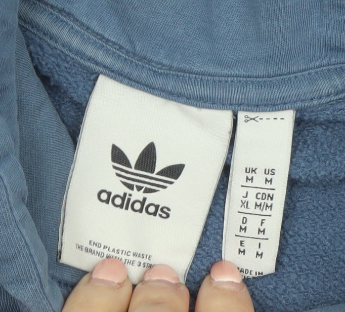 Brand and care label for adidas Men's Blue Pullover Hoodie, size M, Logo Fleece Sweatshirt