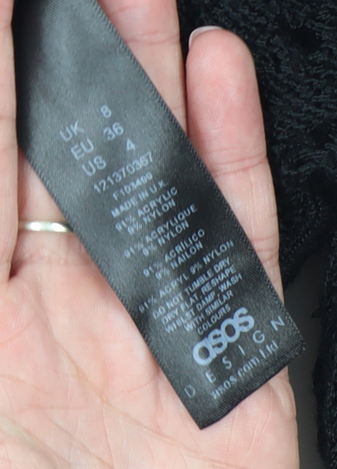 Brand and care label for ASOS DESIGN Women's Black Crochet Long Sleeve jumper, size 8