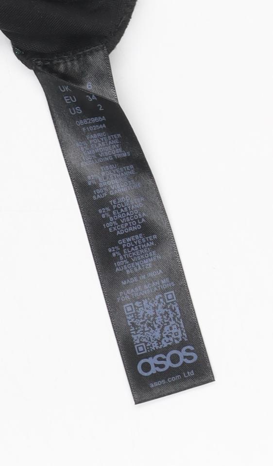 Brand and care label for ASOS Women’s Black Floral Velvet Lace Slip Dress, size UK 6