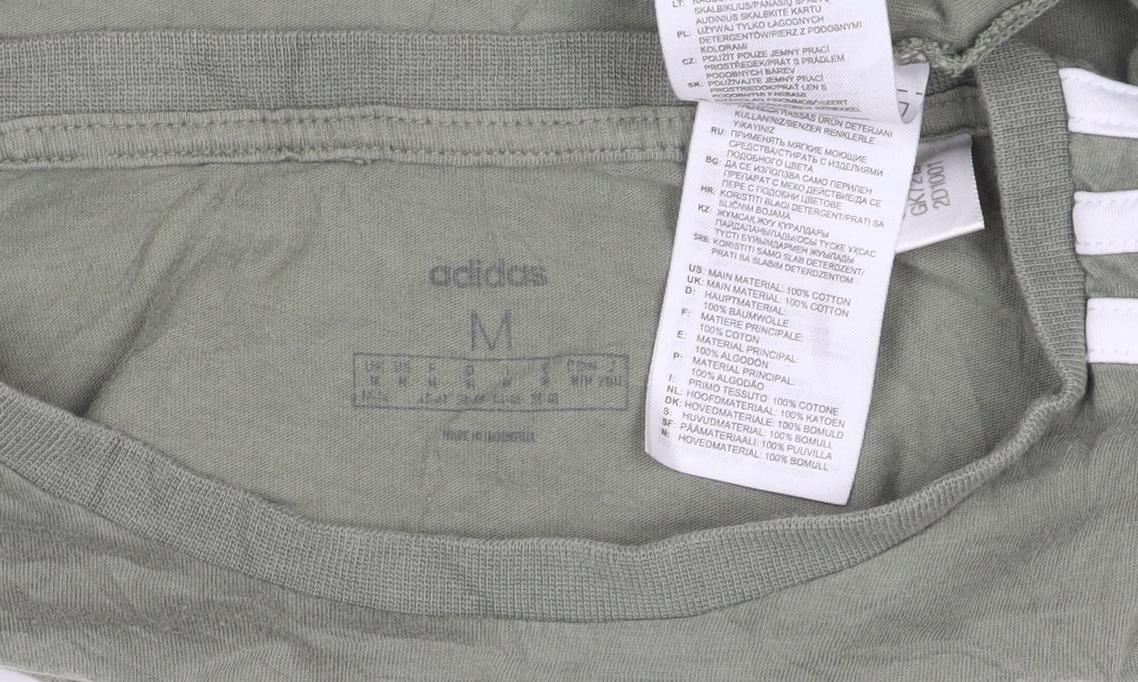 Brand and care label for adidas women’s green cropped t-shirt m relaxed fit short sleeve
