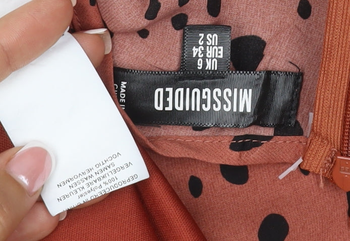 Brand and care label for Missguided Women Orange Animal Print Skater Dress UK 6 Long Sleeve