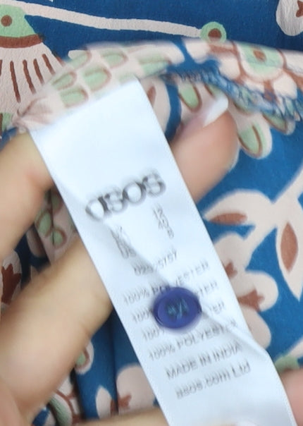Brand and care label for ASOS Women Blue Bird Floral Viscose Button-Up Shirt UK 12
