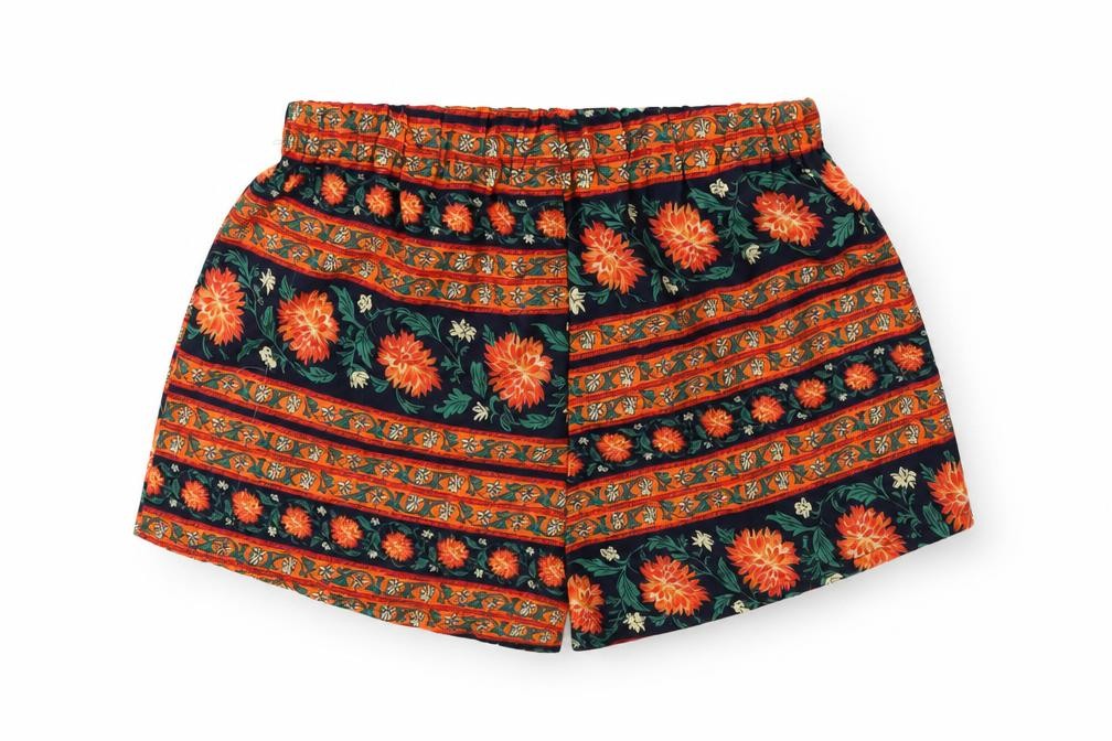 Front view of Preworn women’s orange striped bermuda shorts, size M
