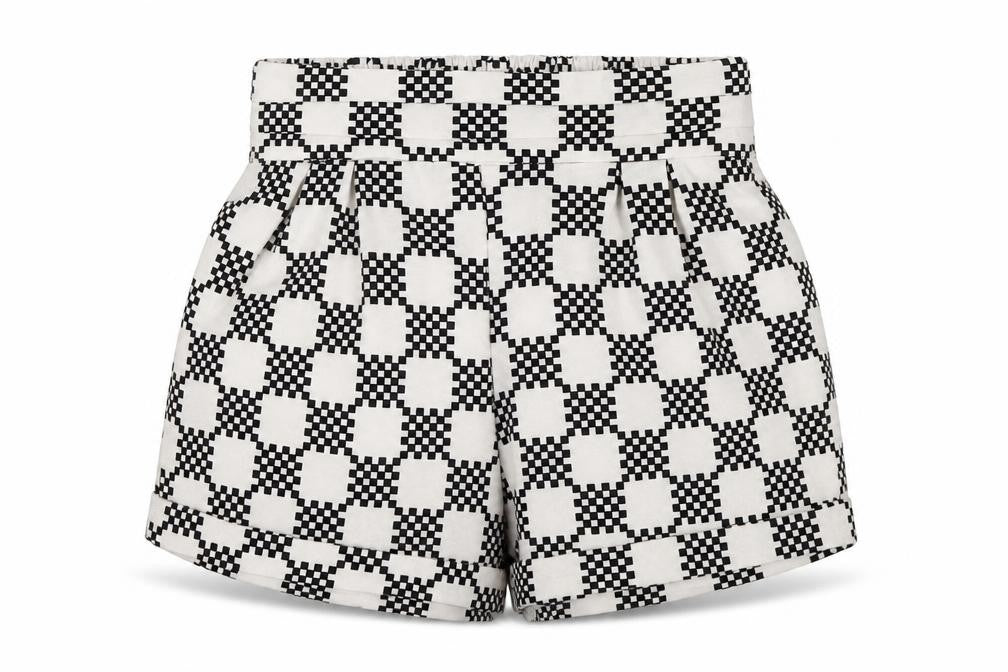 Front view of Paper Scissors women’s multicoloured geometric hot pants shorts, size UK 8