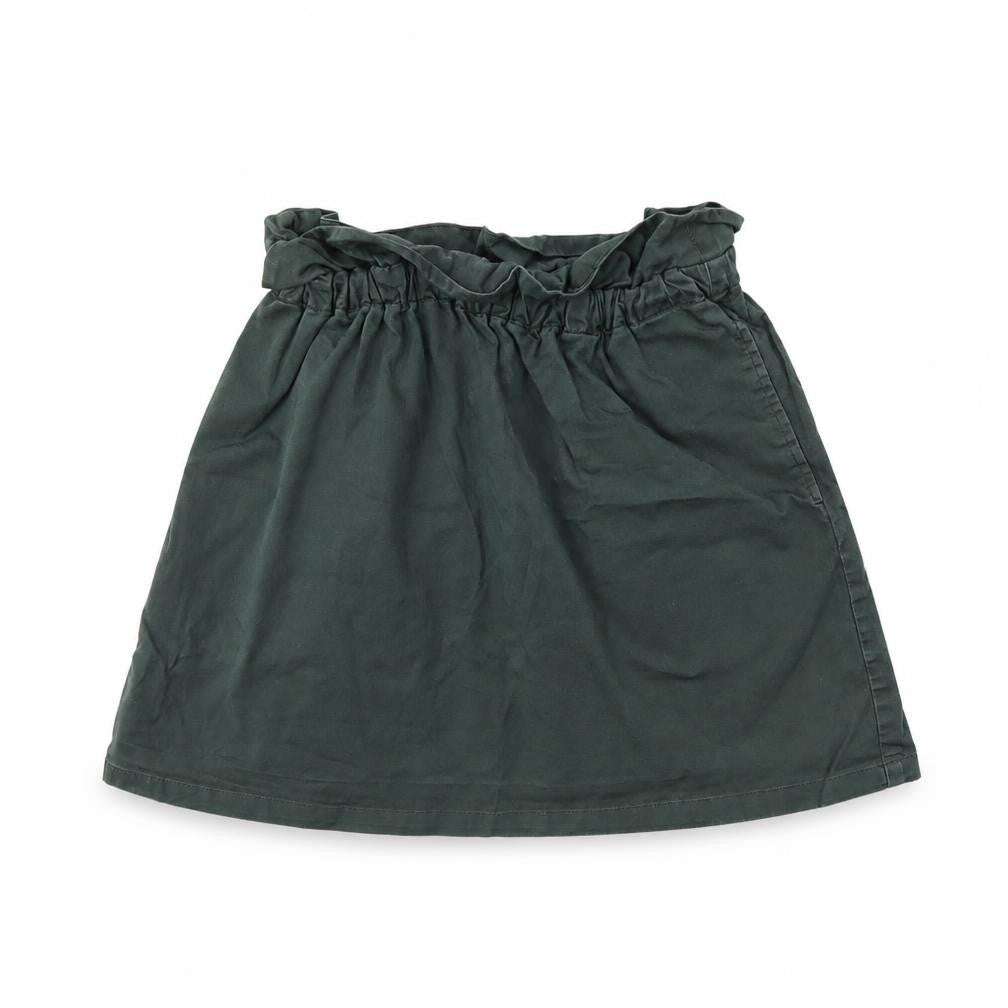 Front view of Uniqlo girls’ grey mini skirt, size 7, years