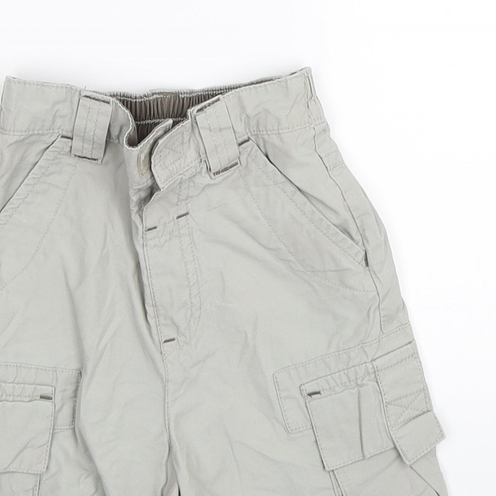 Close-up detail of Next boys’ beige cargo trousers, size 12, months - shorts