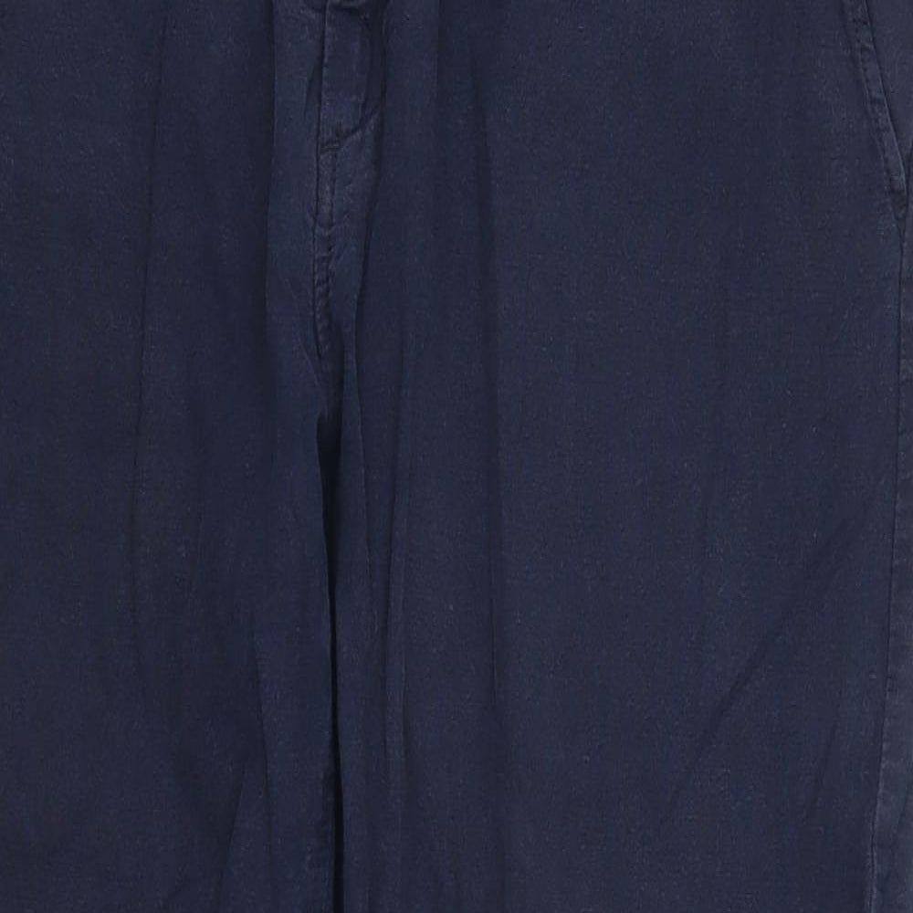 Close-up detail of H&M women’s blue trousers, size UK 8, 27-inch leg