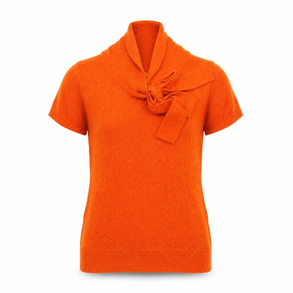 Front view of H&M women’s orange jumper, size UK 10