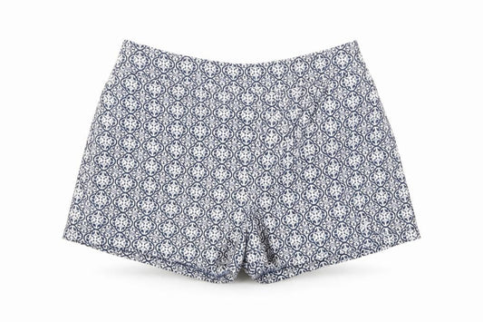 Front view of F&F women’s blue floral hot pants shorts, size UK 23, in