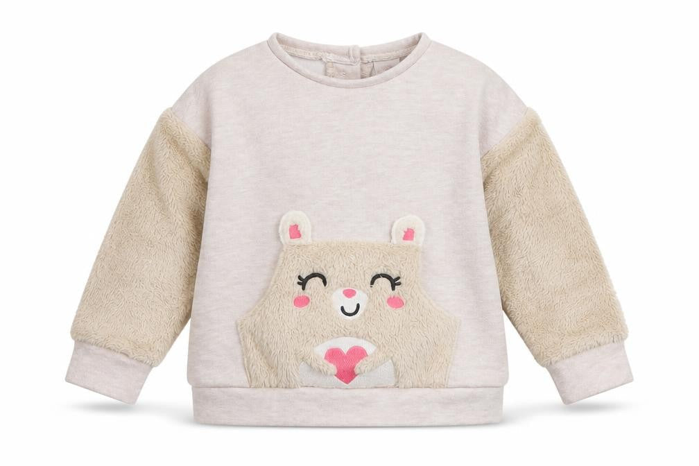 Front view of LC Waikiki girls’ ivory jersey jumper, size 6-9, months - bear