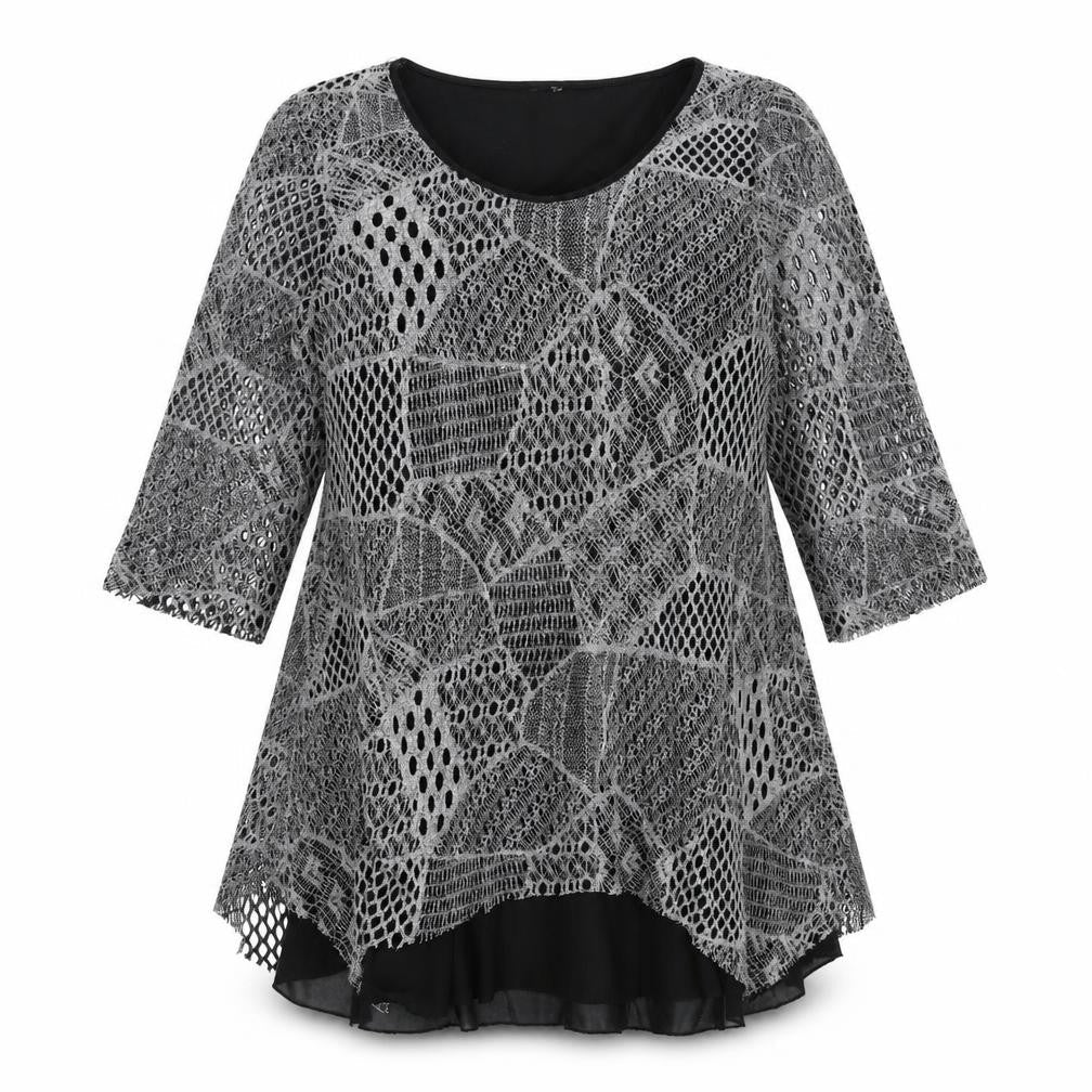 Front view of women’s black fit & flare, size UK 14, - layered with silver/grey