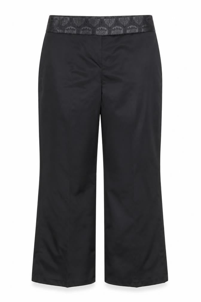 Front view of Next women’s black trousers, size UK 14, 29-inch leg