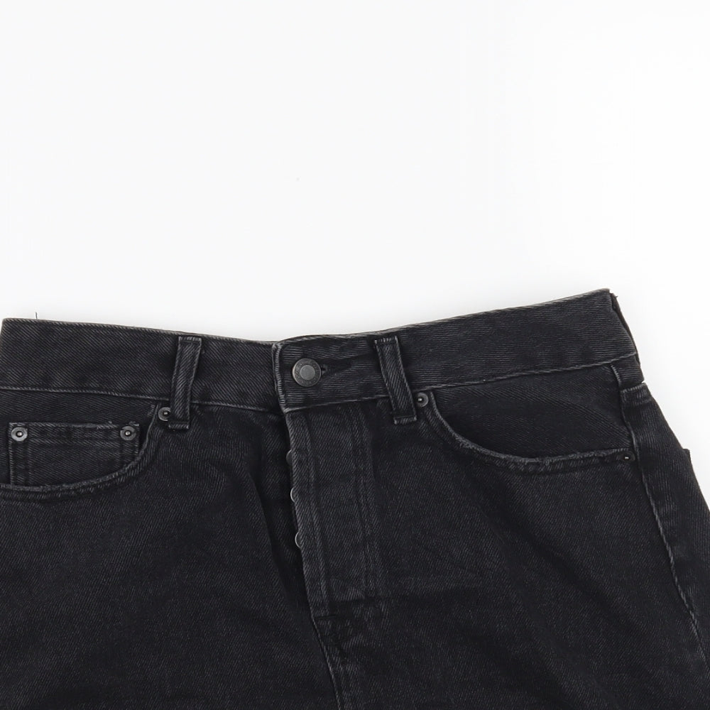 Close-up detail of Bershka women’s black mini skirt, size UK 8