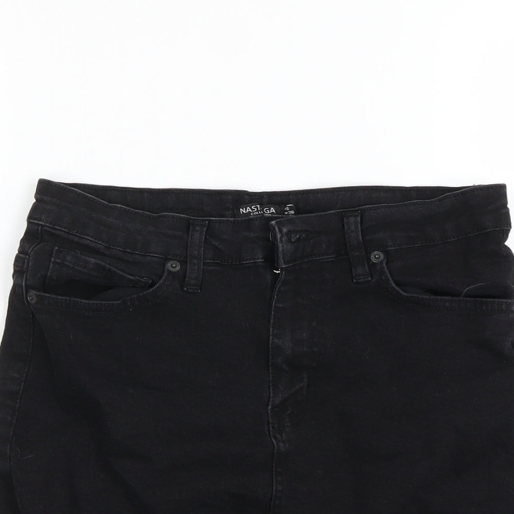 Close-up detail of Nasty Gal women’s black mini skirt, size UK 8