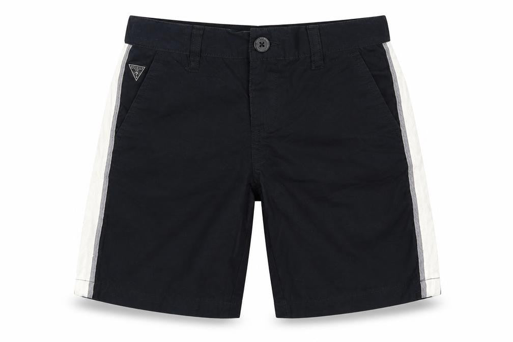 Front view of Guess kids girls’ black chino shorts, size 7, years