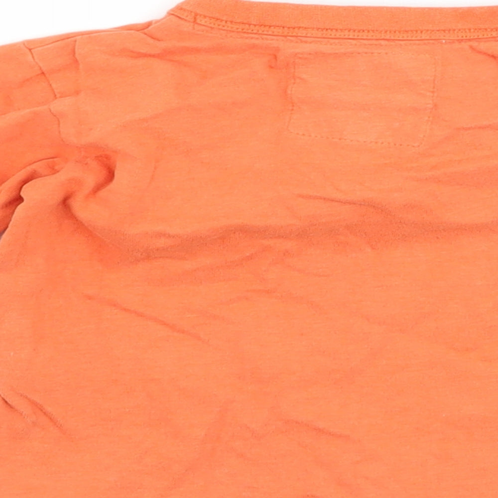 Brand and care label for RJR.John Rocha boys’ orange basic t-shirt, size 12-18, months