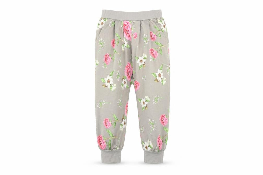 Front view of Preworn girls’ grey floral harem trousers, size 8, years