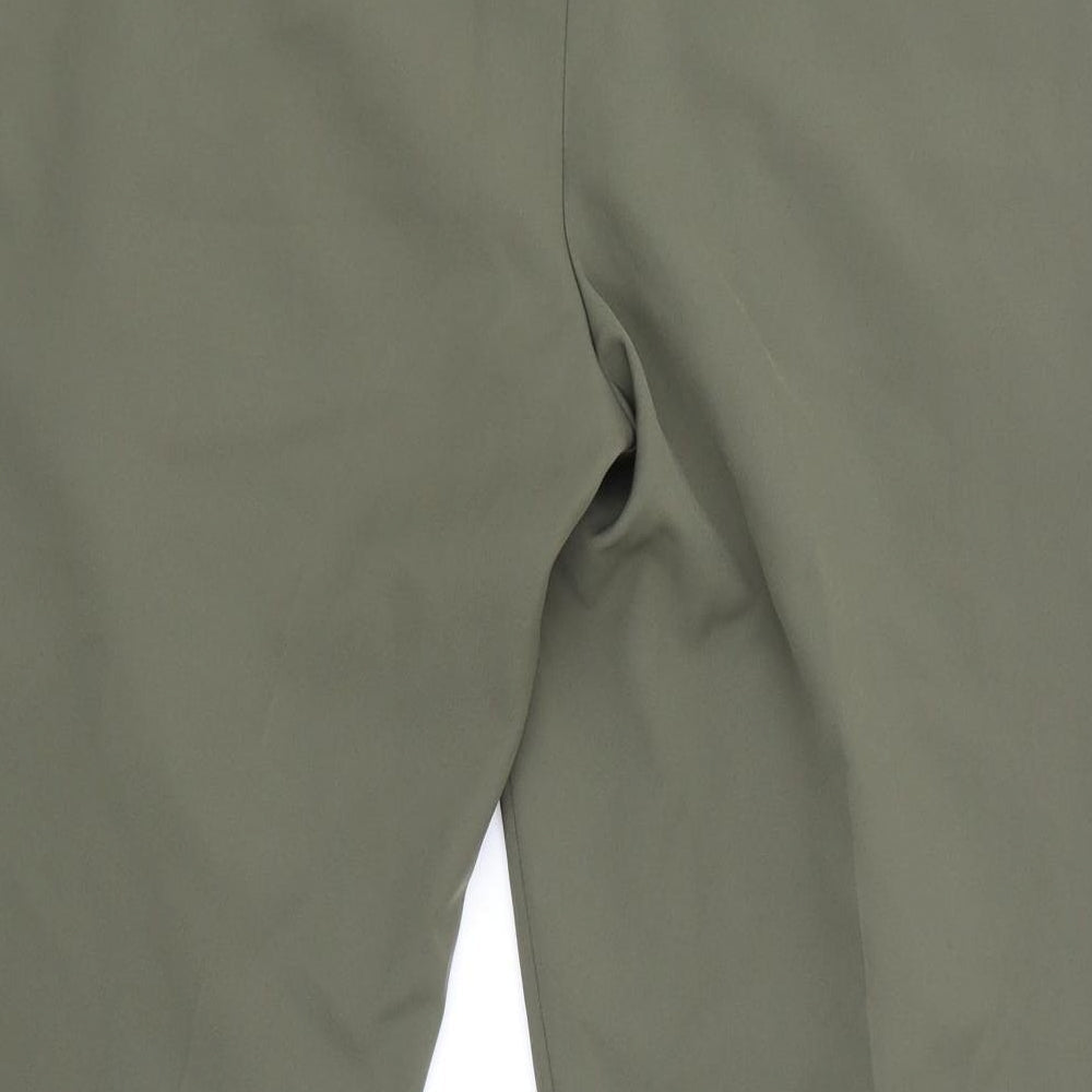 Brand and care label for NewLook women’s green houndstooth trousers, size UK 8