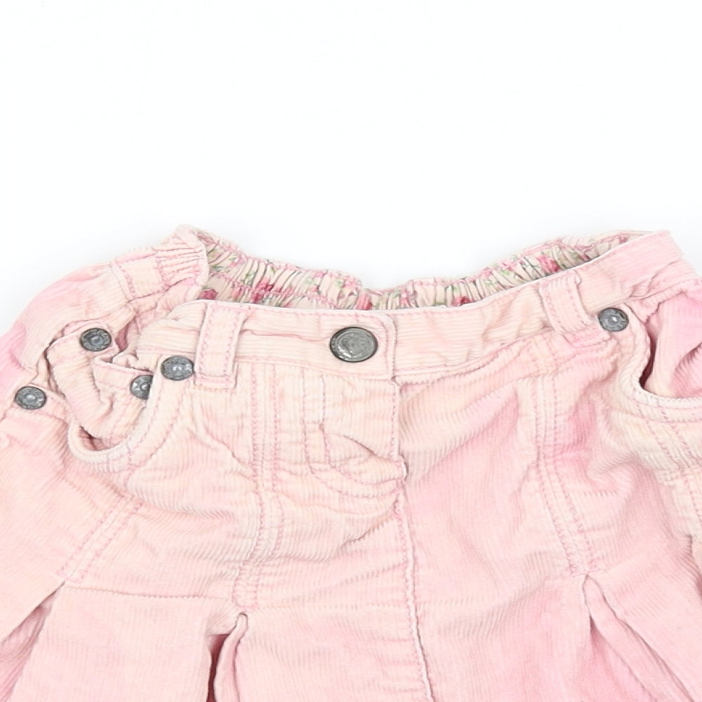 Close-up detail of Next girls’ pink mini skirt, size 2, years