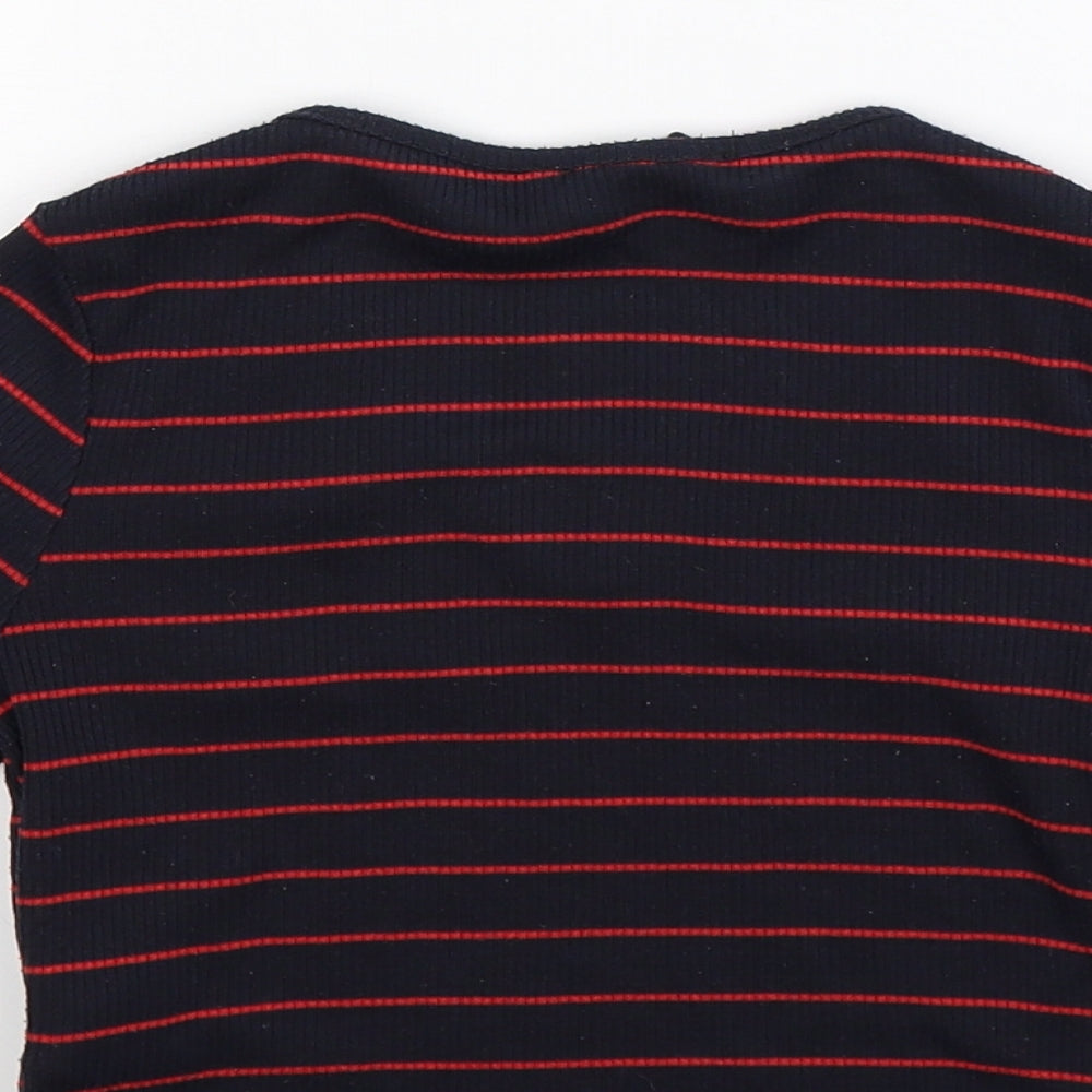 Brand and care label for New Look girls’ blue striped jumper, size 14-15, years