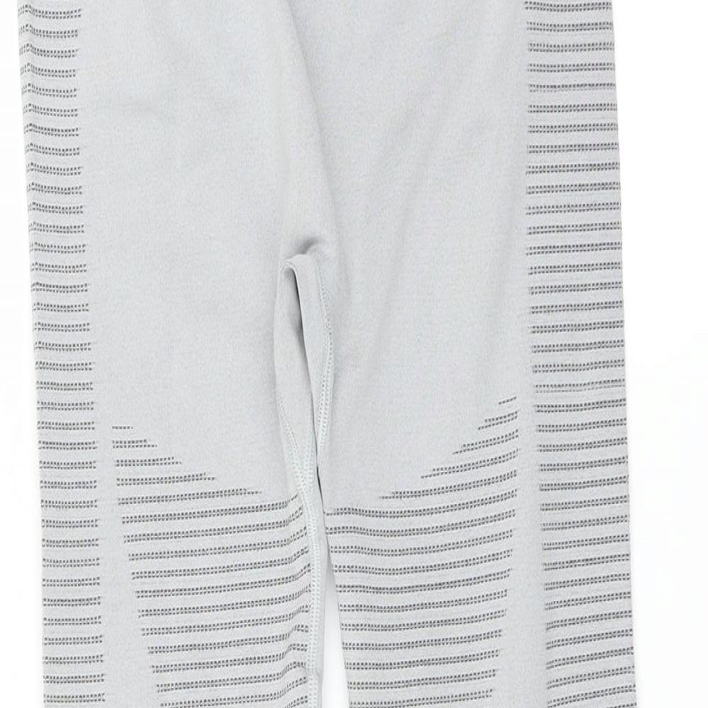 Brand and care label for Preworn women’s grey compression leggings, size L, 27-inch leg